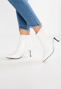 Bottines blanches à talons